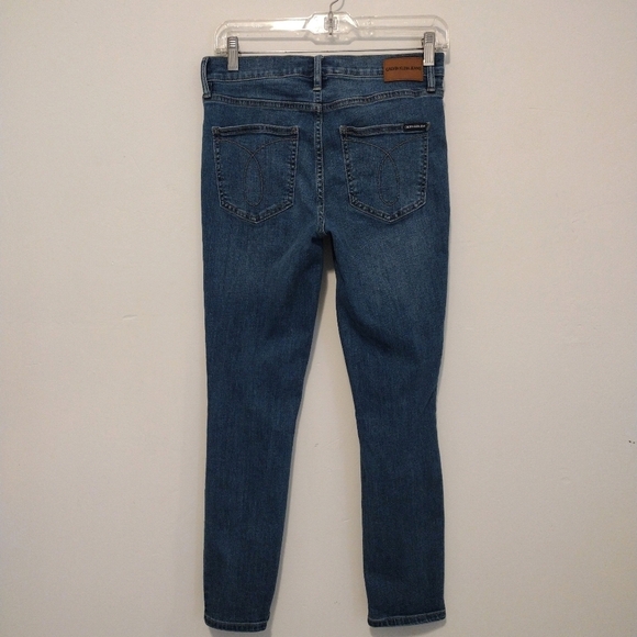 Calvin Klein - Distressed Mid Rise Skinny Jeans - Picture 7 of 15